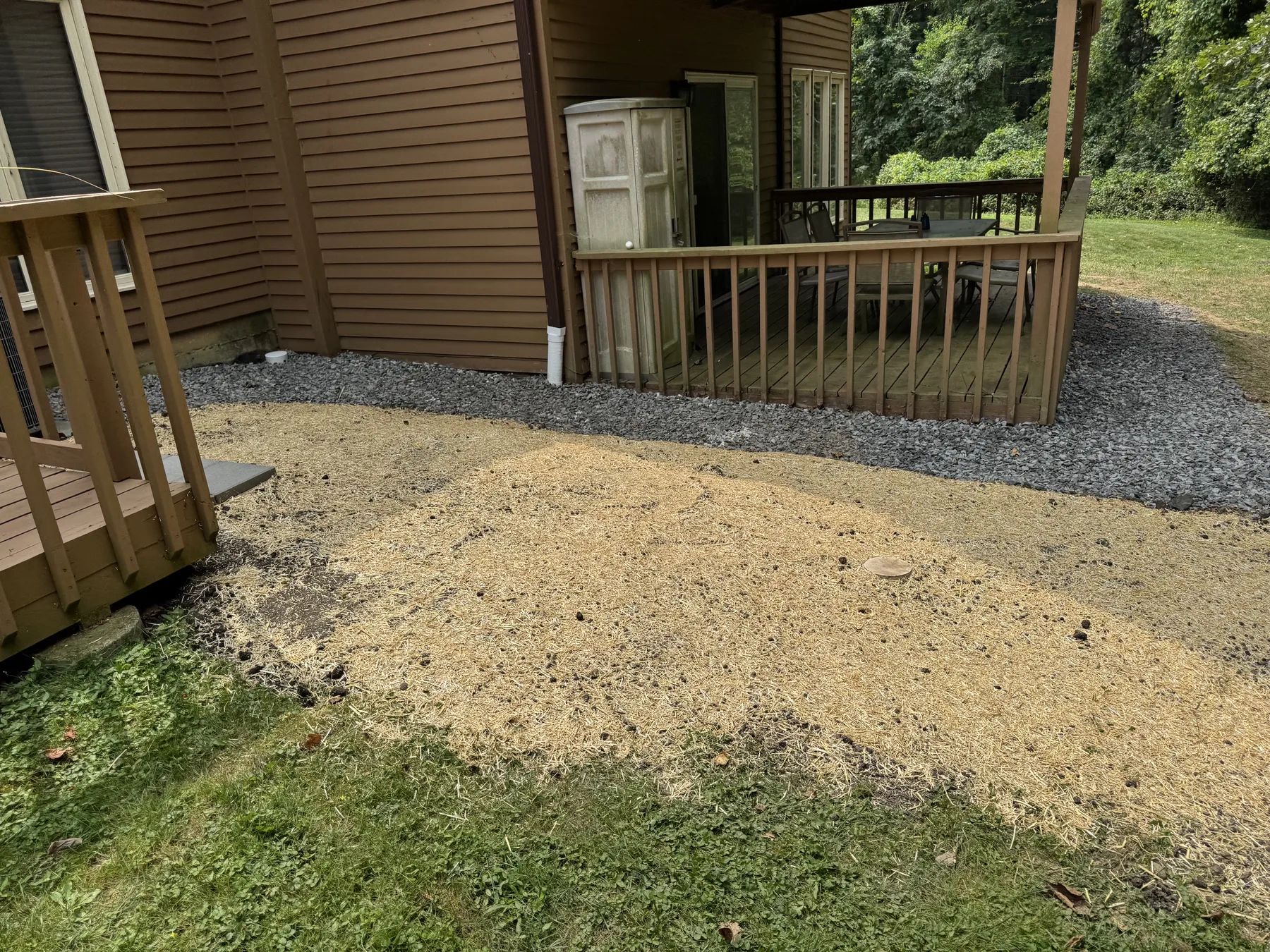 Completed drainage and grading work beside a New York property